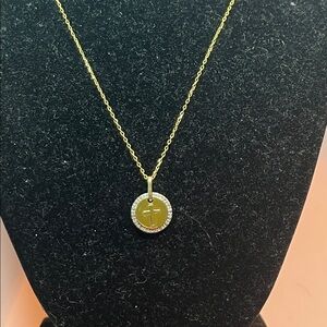 ka 1772 Italy 925 gold circle with a cross necklace